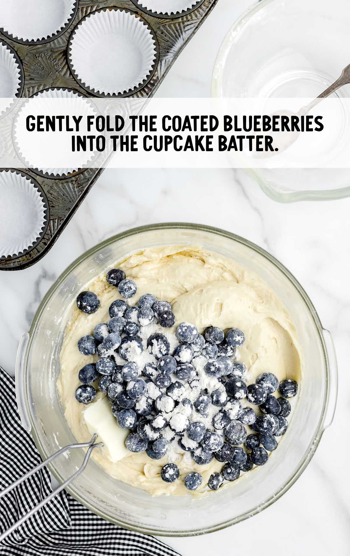 blueberries folded into the cupcake batter