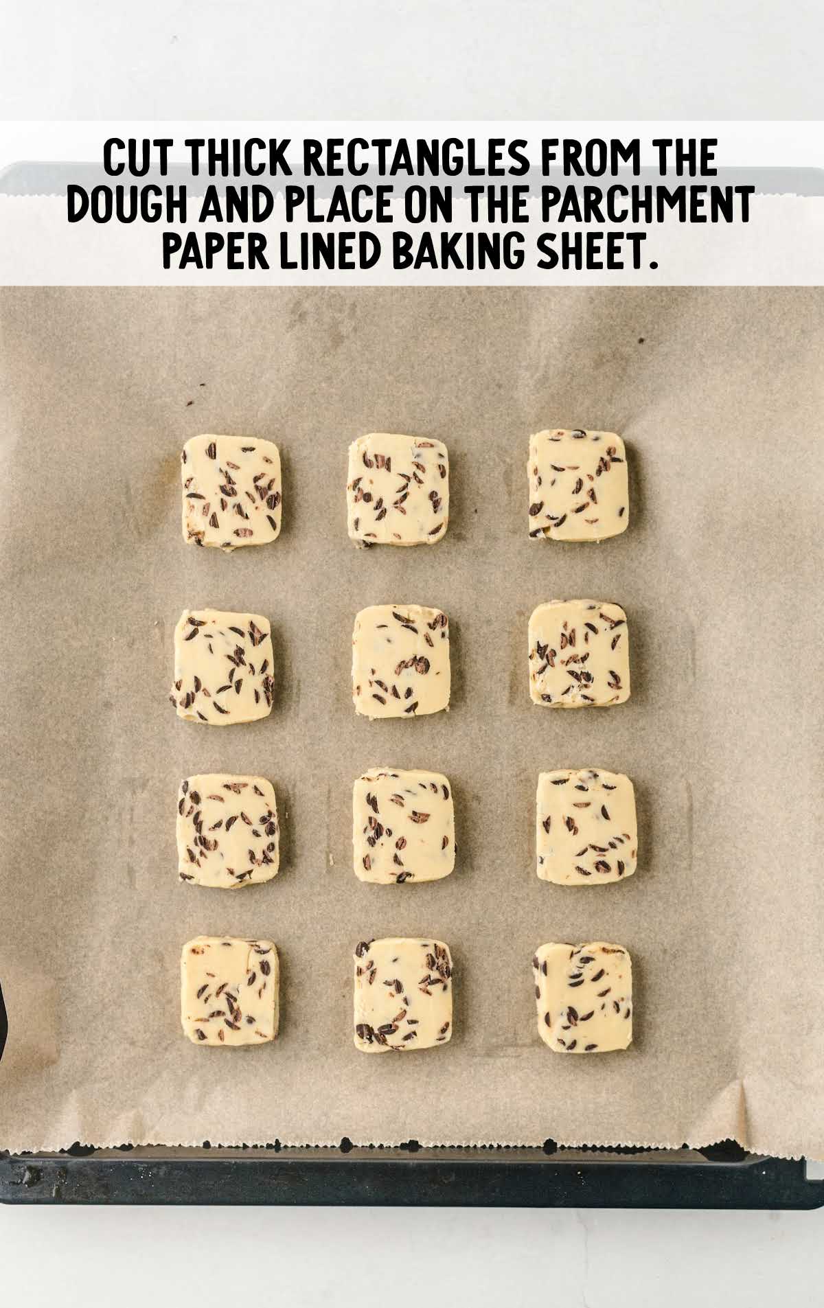dough cut into rectangles and placed on a parchment paper lined baking sheet