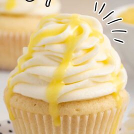 a close up shot of a Lemon Drizzle Cupcake on a plate