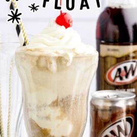 a close up shot of Root Beer Float in a tall glass