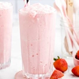 a close up shot of Strawberry Frosty in a tall glass