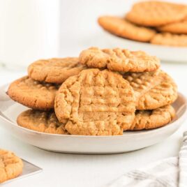 a close up shot of 3 Ingredient Peanut Butter Cookies on a plate
