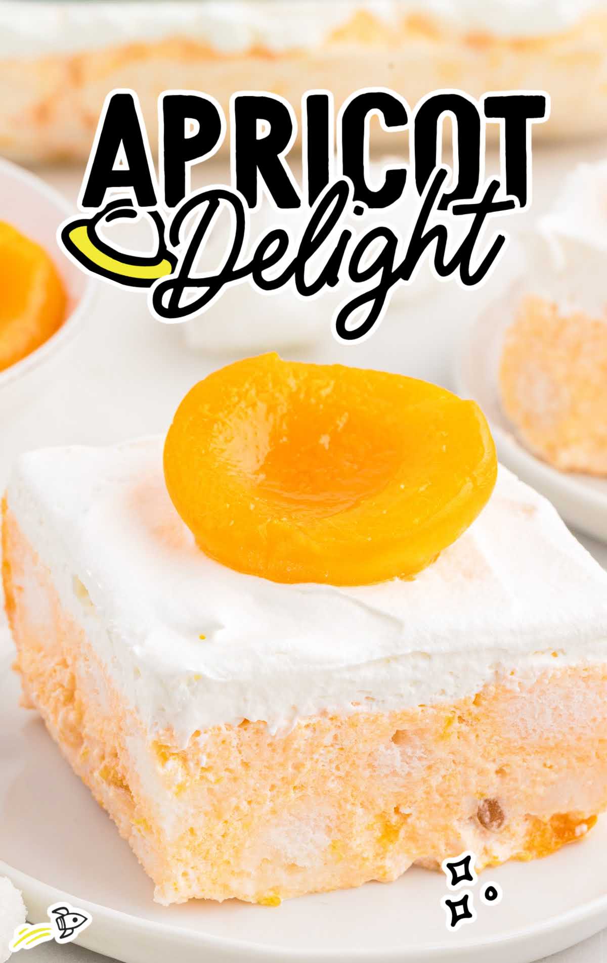 a close up shot of a slice of Apricot Delight on a plate
