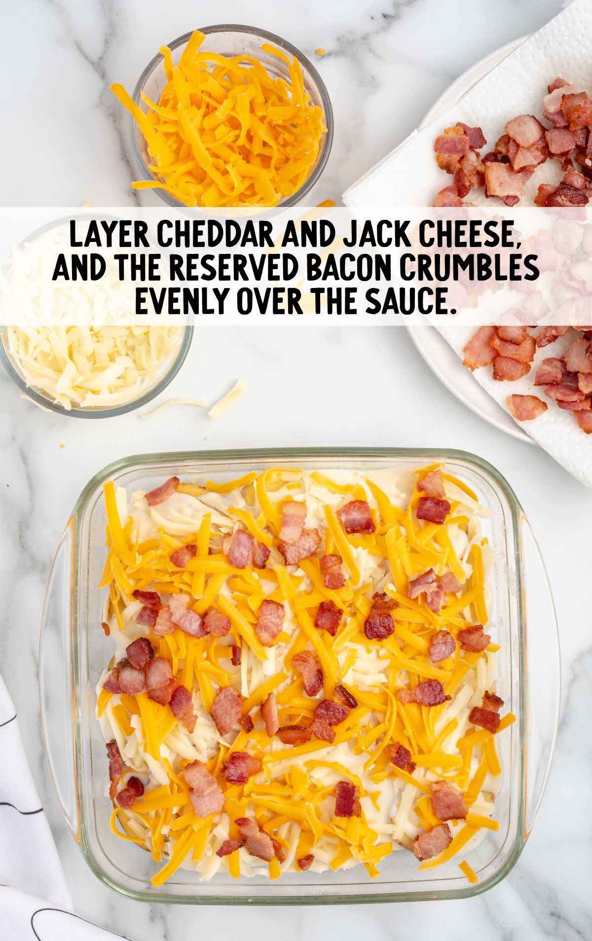 cheddar and jack cheese and bacon layered over the sauce