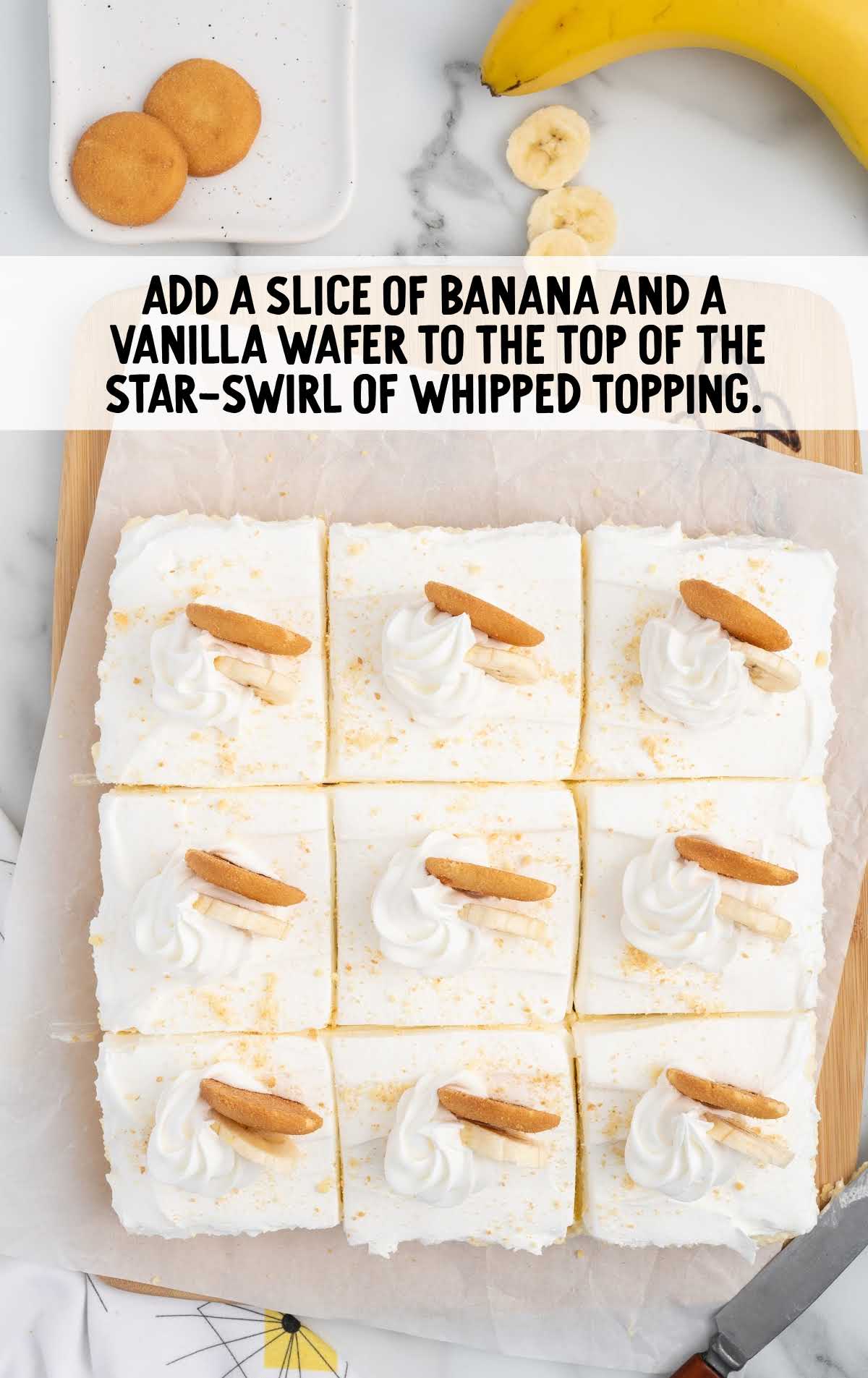slices of banana and vanilla wafer added to the top of the whipped topping