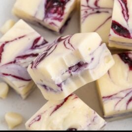 a close up shot of Blueberry Fudge with one having a bite taken out of it