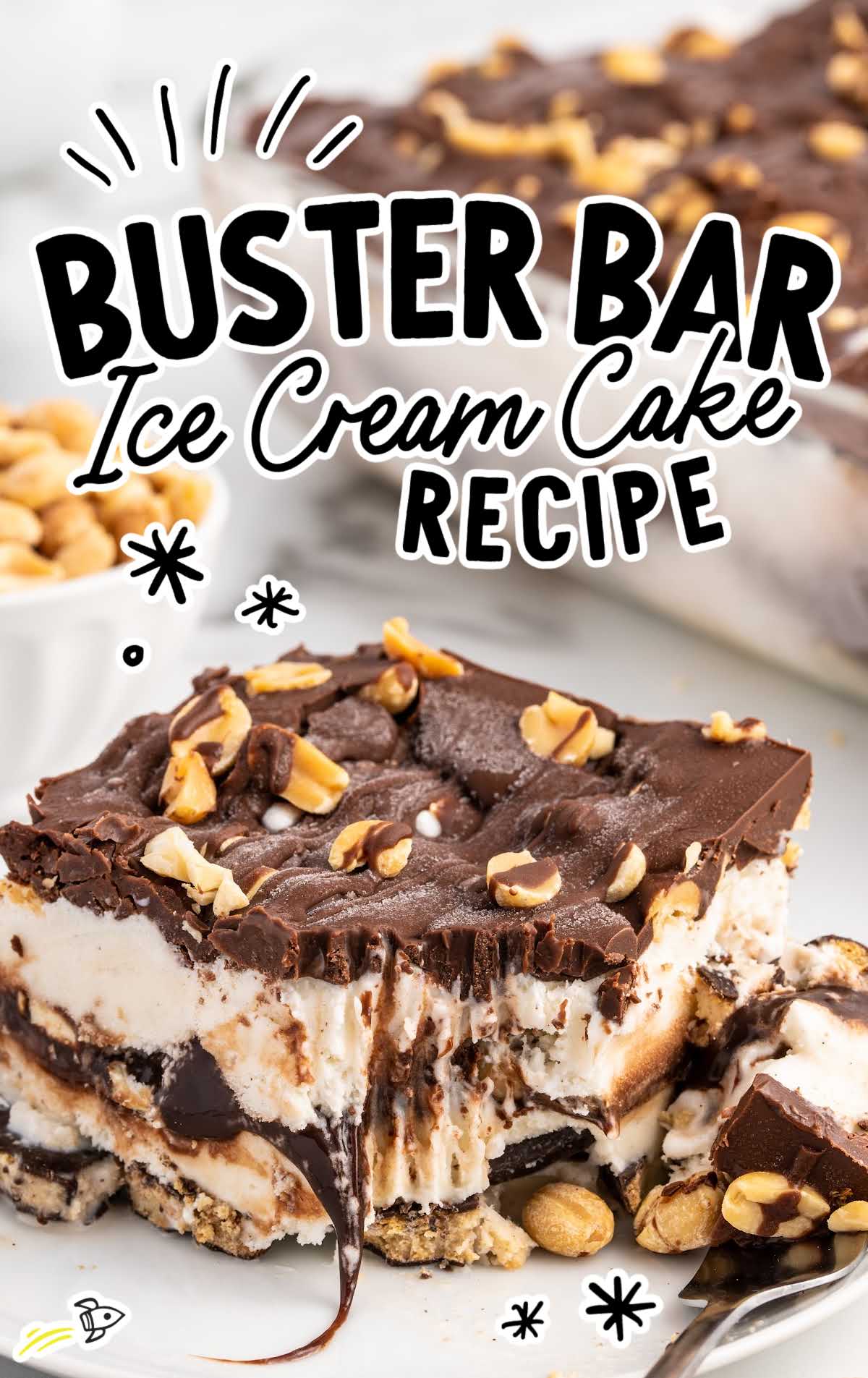 a close up shot of a piece of Buster Bar Ice Cream Cake on a plate with a piece taken out of it