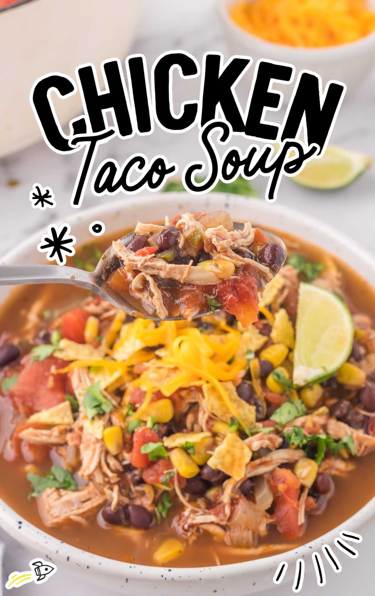 a close up shot of Chicken Taco Soup in a bowl