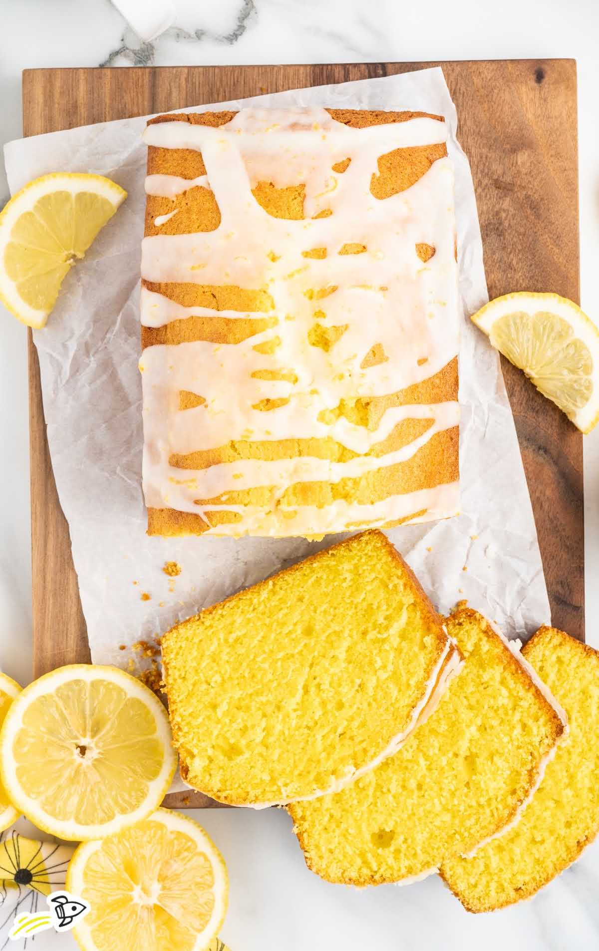 overhead shot of slices of Lemon Pound Cake on a cutting board