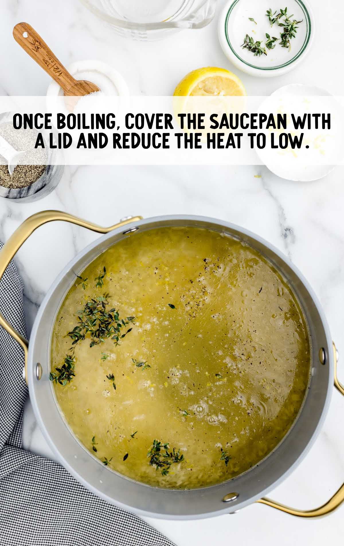 cover saucepan with lid and reduce heat