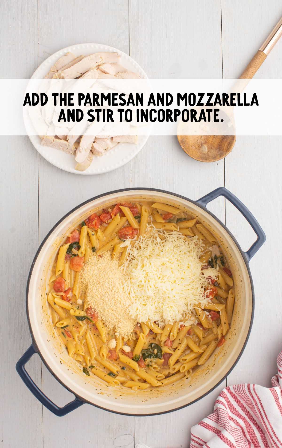 parmesan and mozzarella cheese added and stirred with the pasta ingredients