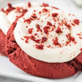 a close up shot of Red Velvet Cream Cheese Cookies on a plate