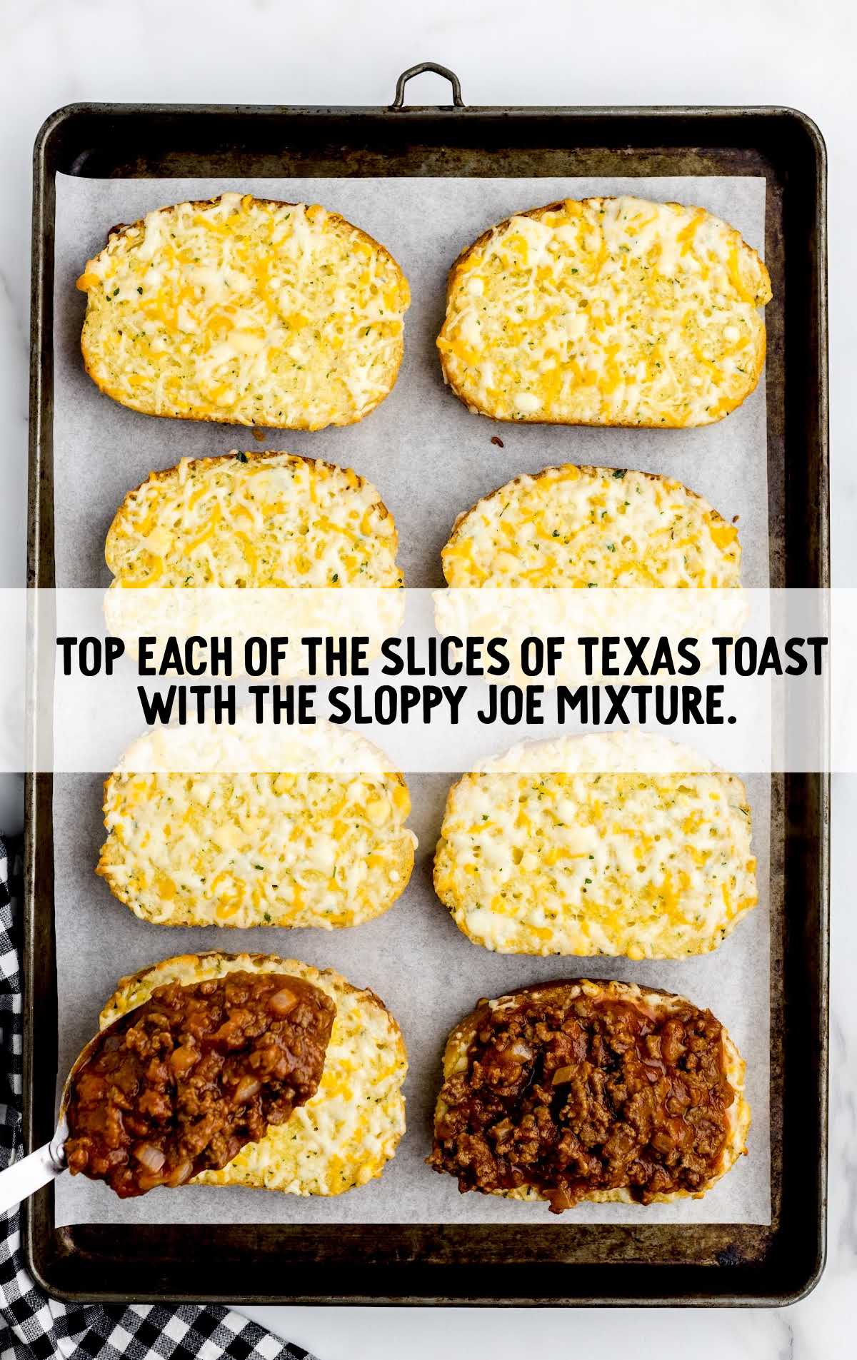 sloppy joe mixture topped on top of each texas toast