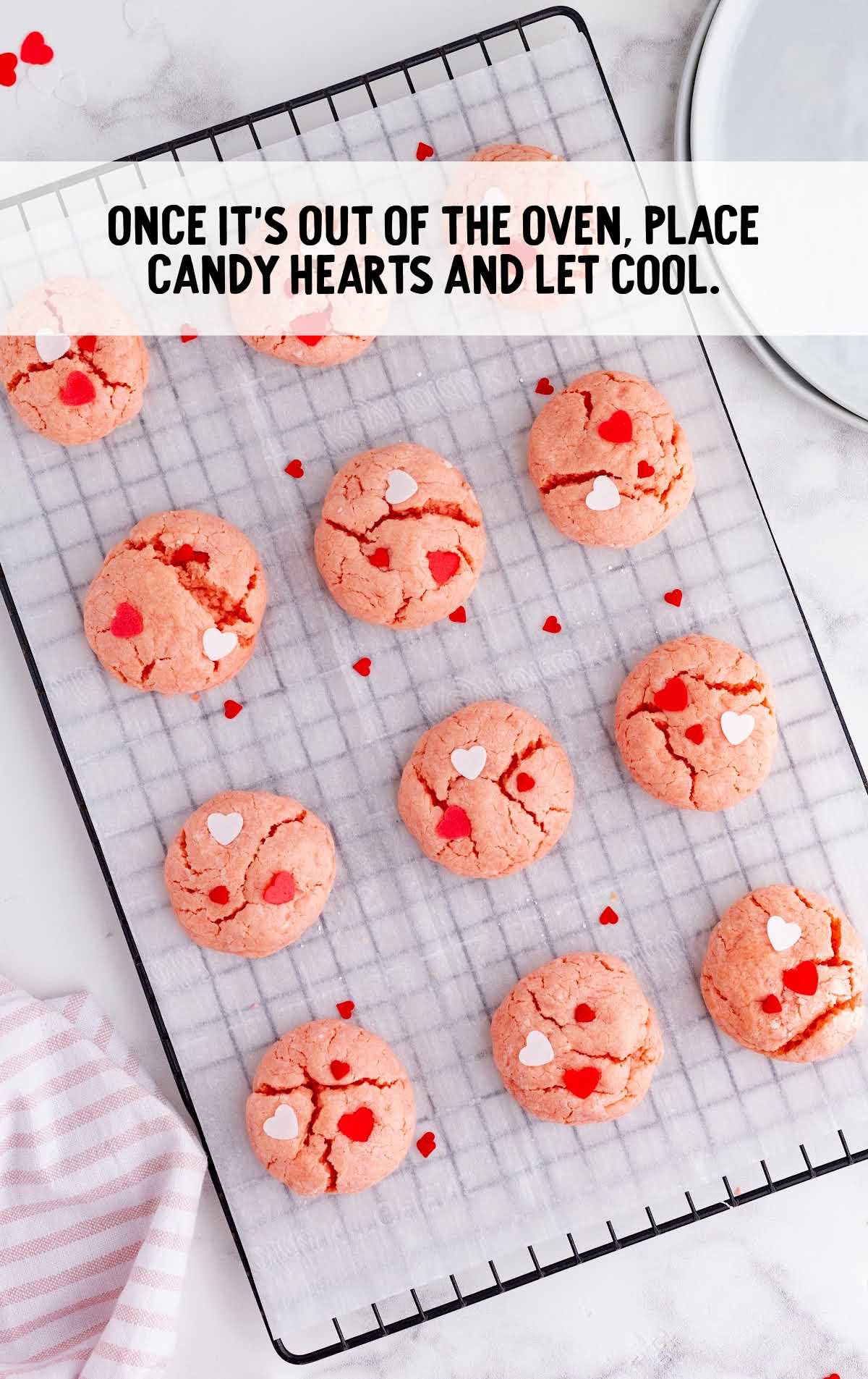 candy hearts placed on the cookies and let it cool down