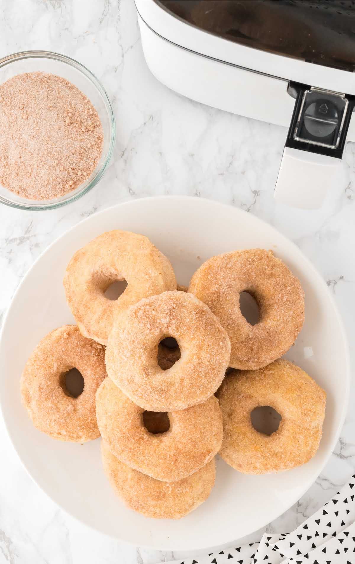 overhead shot of a plate of Air Fryer Donuts