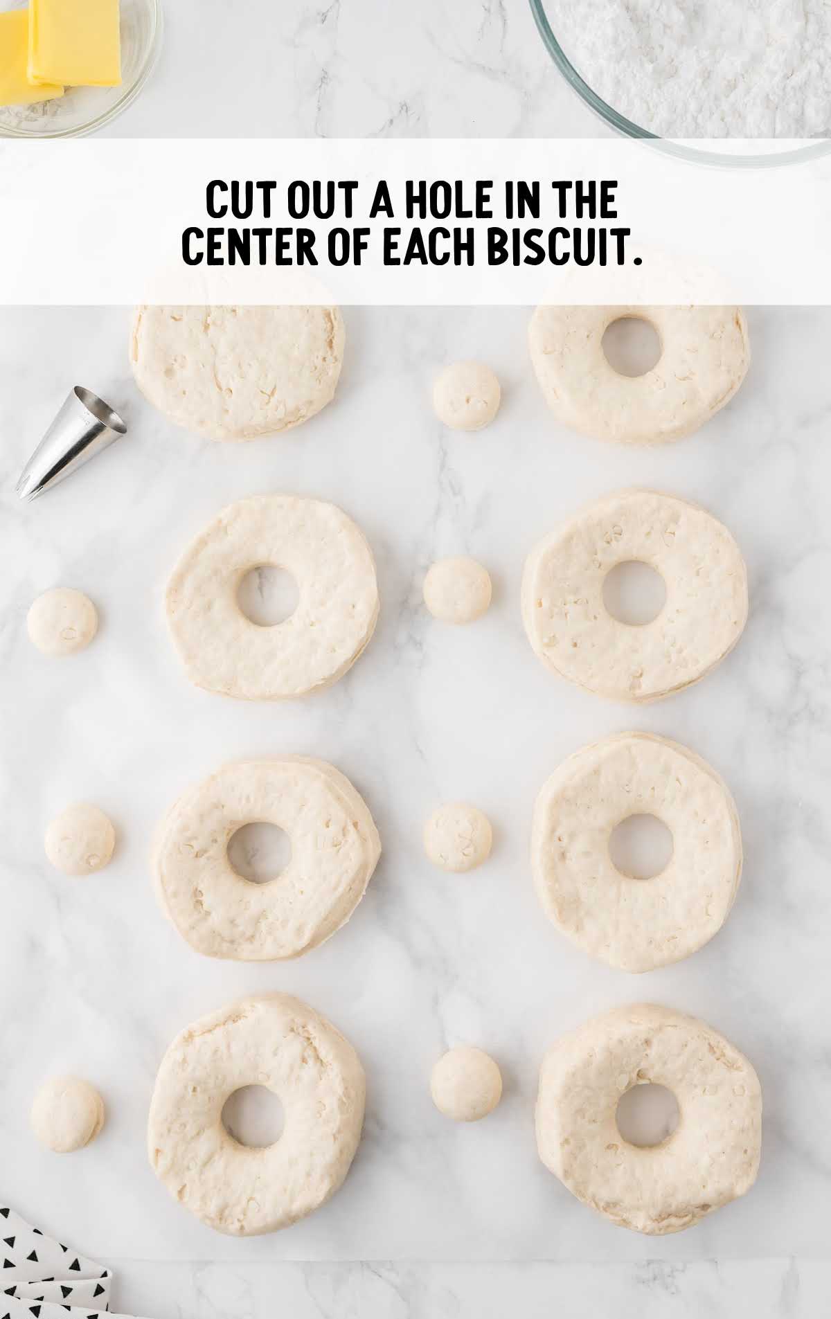 cut a hole out in the center of each biscuit