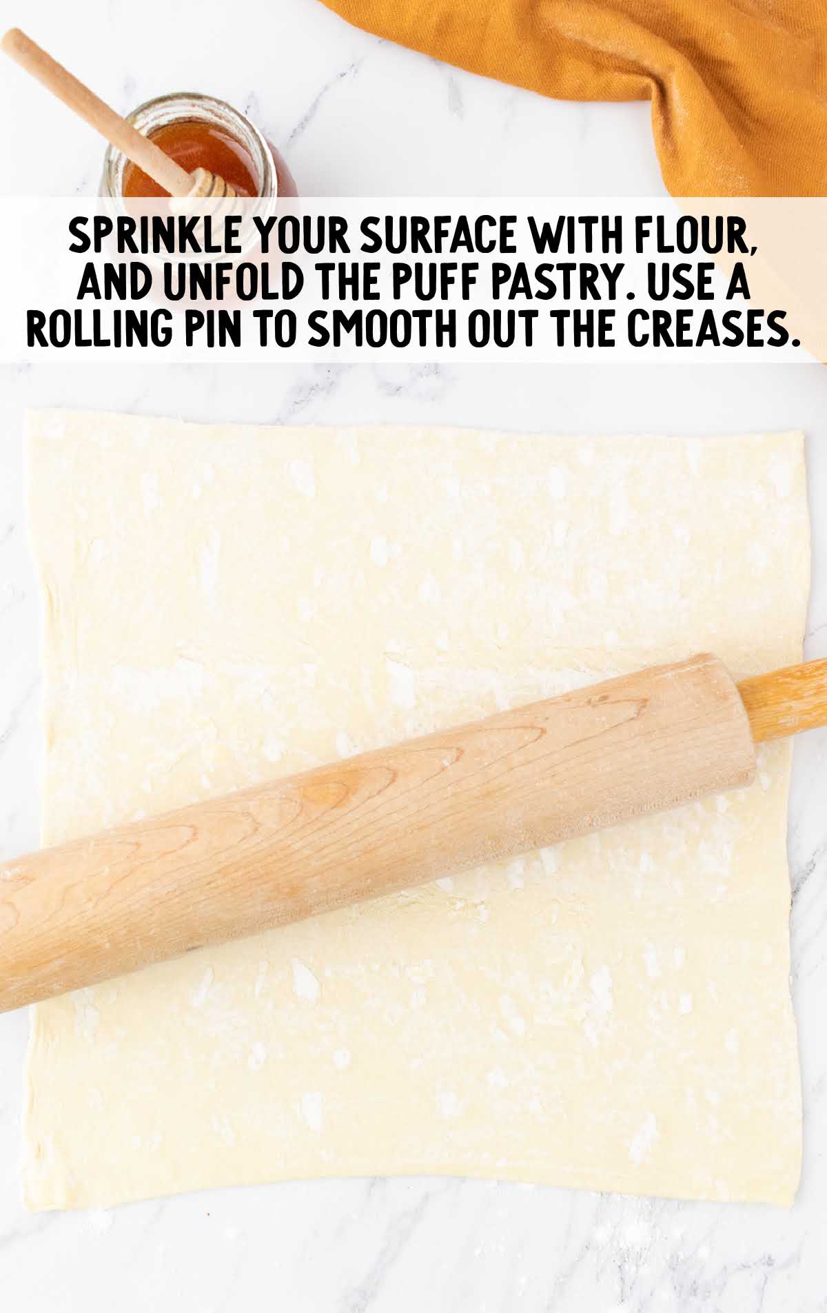 sprinkle the surface with flour, and unfold the puff pastry