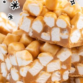 a close up shot of Butterscotch Marshmallow Bars on top of each other