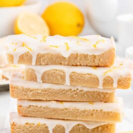 a close up shot of a couple of Lemon Shortbread stacked on top of each other