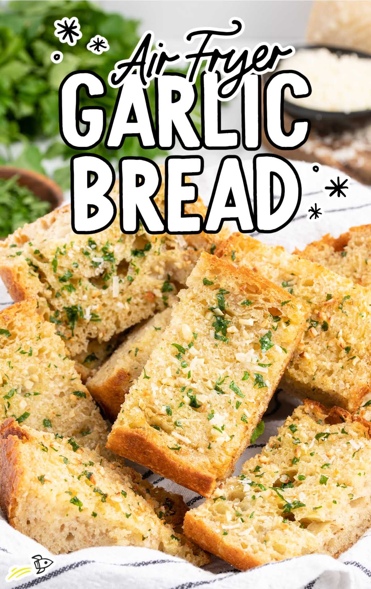 a close up shot of a multiple Air Fryer Garlic Bread in a basket