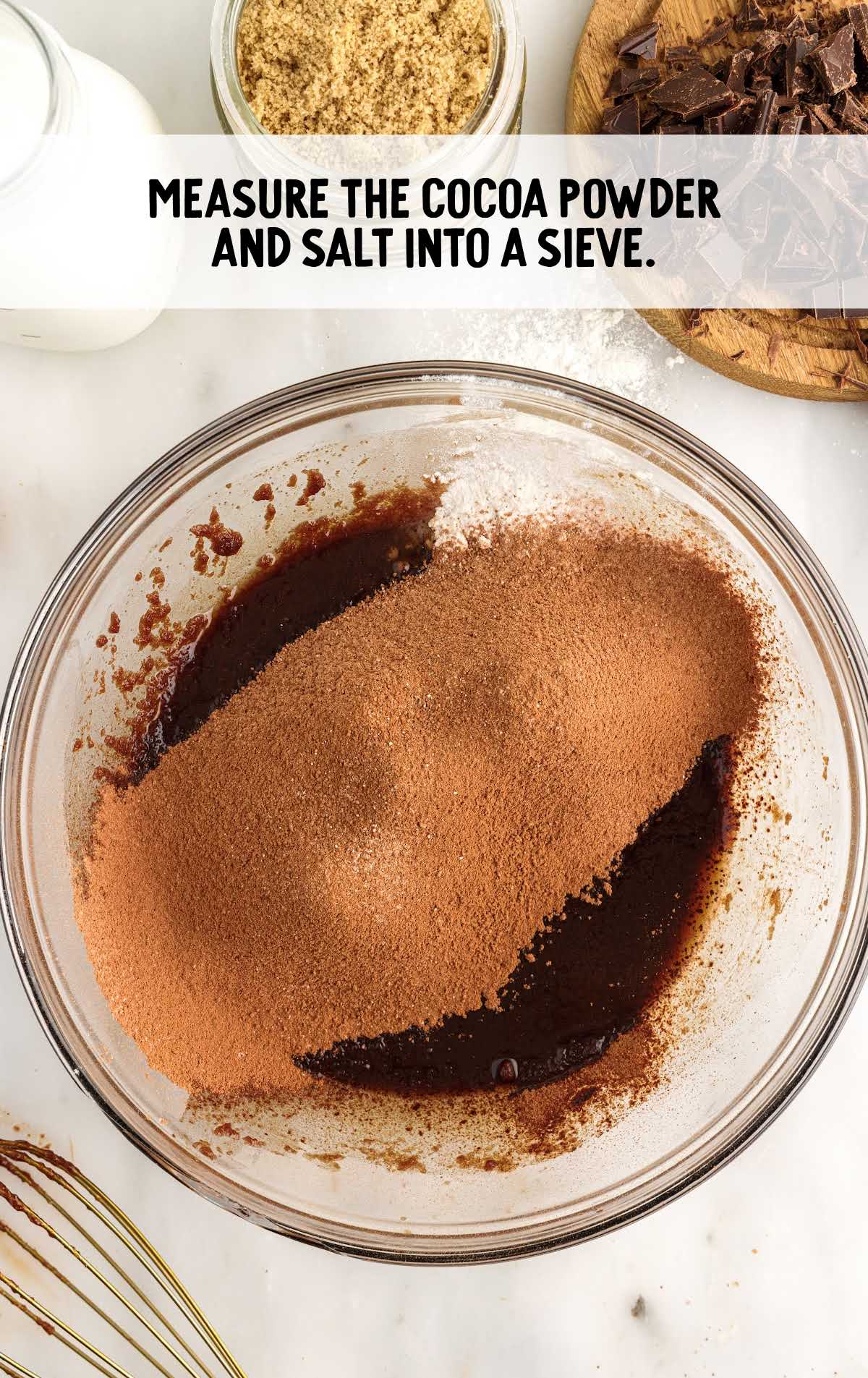 cocoa powder and salt measured into a sieve