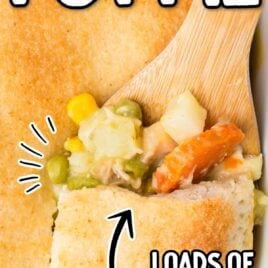 a close up shot of a piece of Easy Chicken Pot Pie being picked up by a wooden spoon