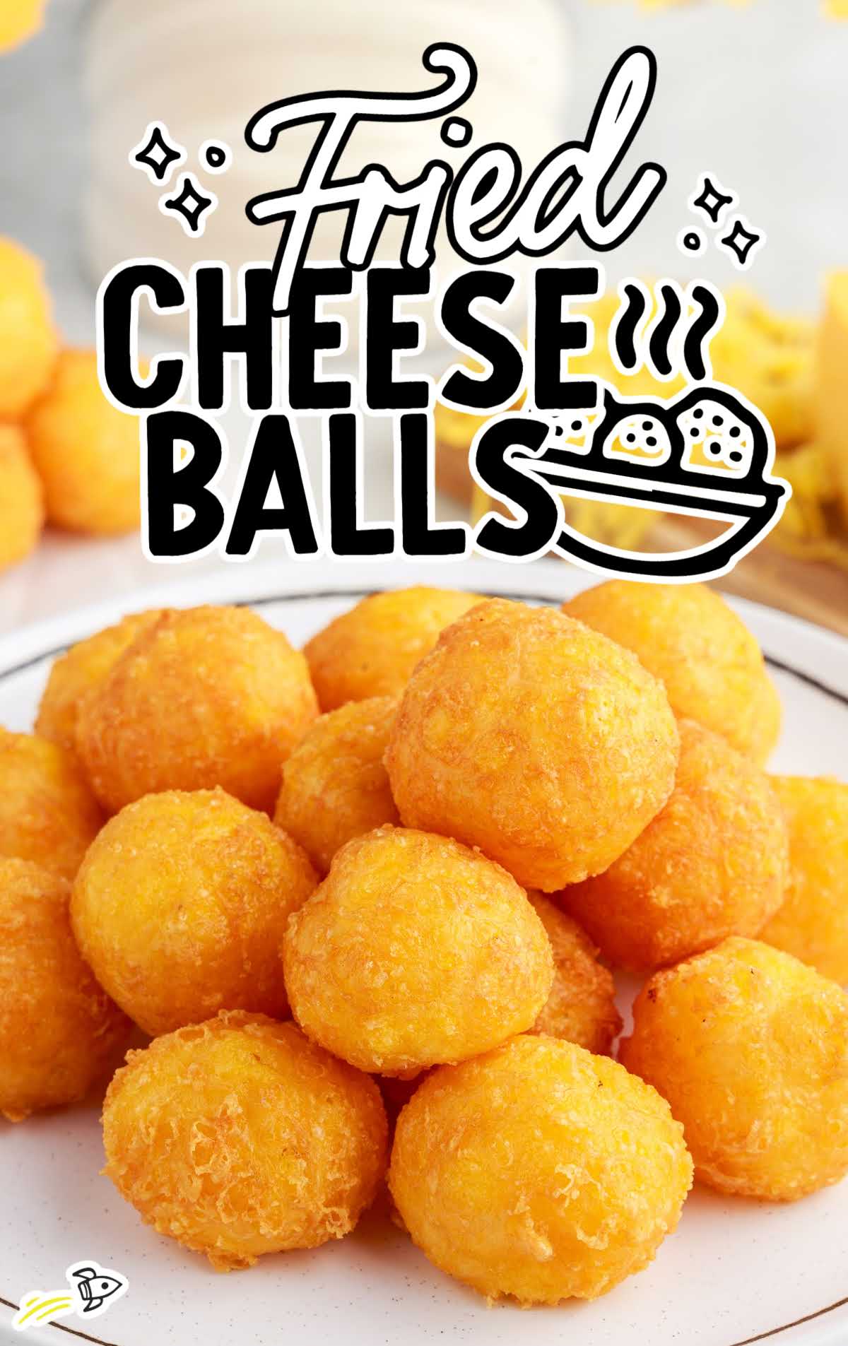 close up shot of Fried Cheese Balls piled on a plate