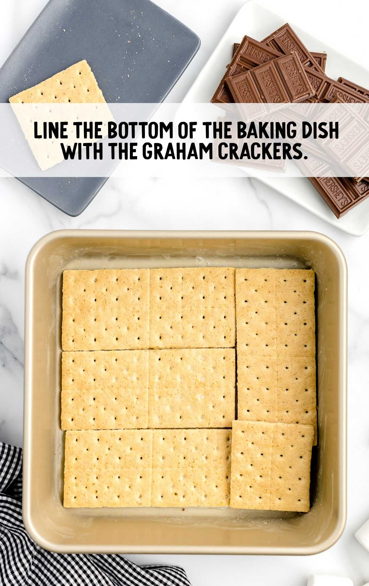graham crackers placed on the bottom of the baking dish
