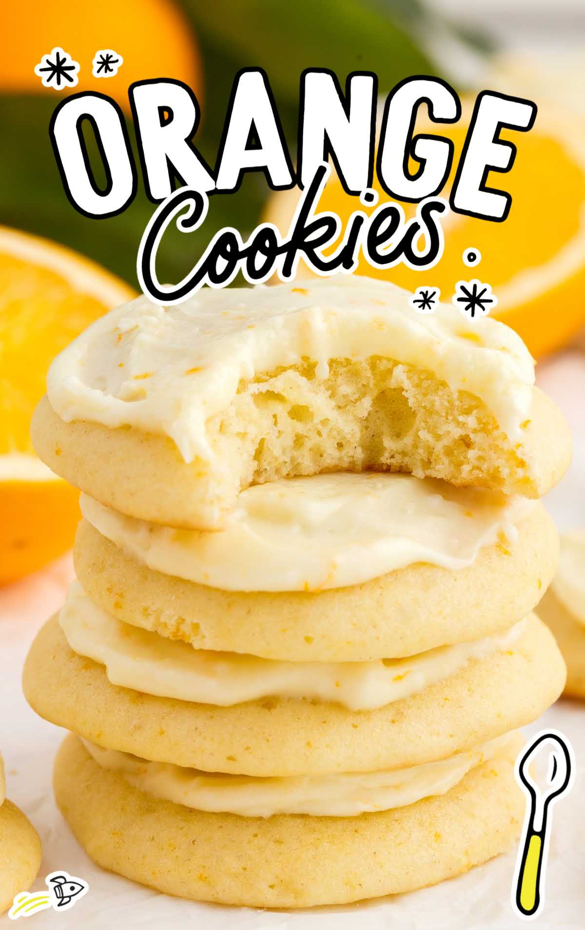 a close up shot of Orange Cookies stacked on top of each other with one having a bite taken out