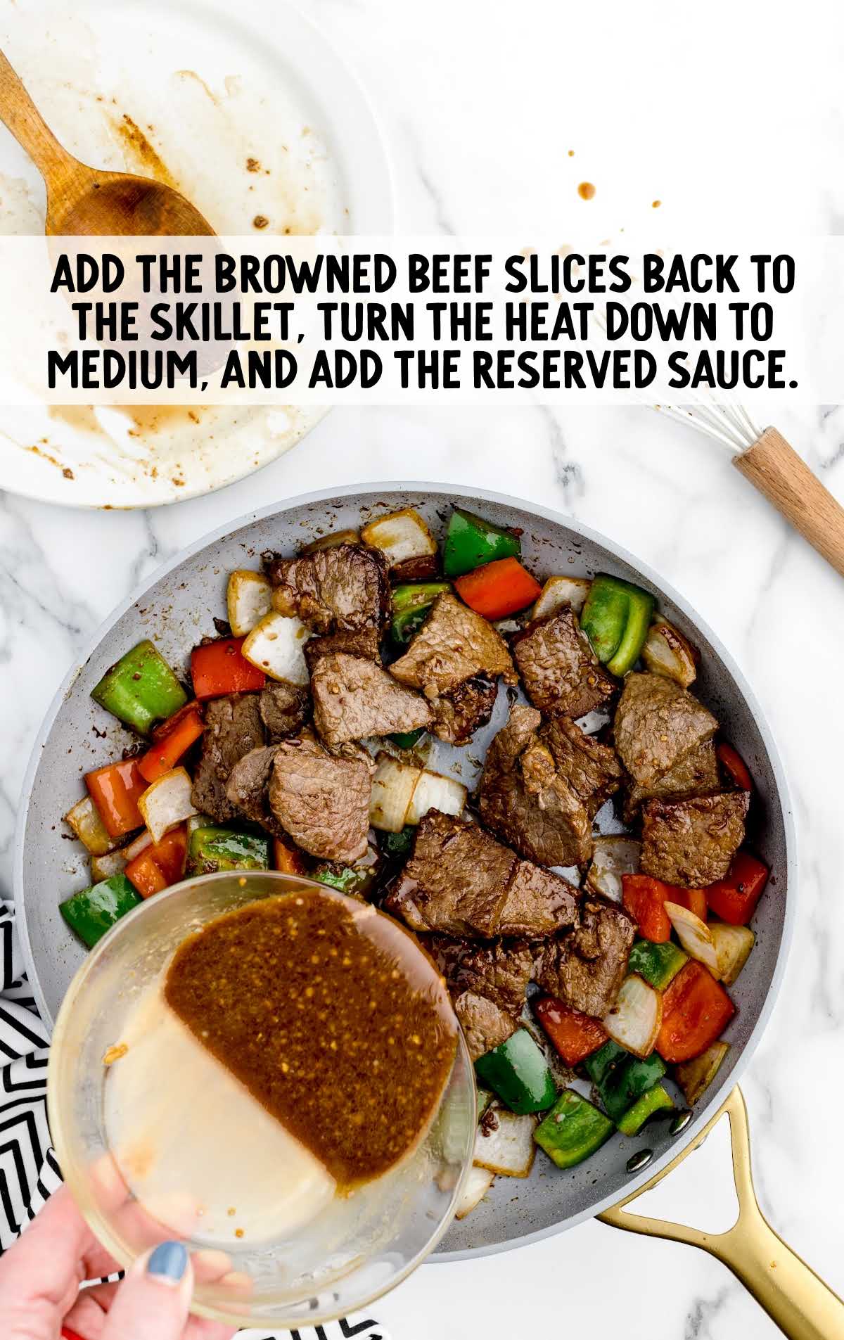 browned beef added back to the skillet and add reserved sauce