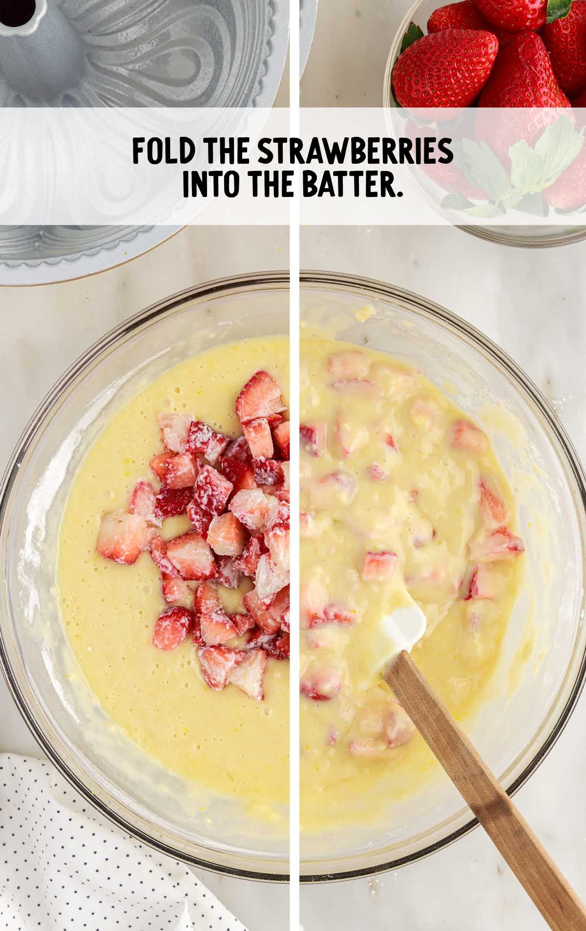 chopped strawberries folded into the cake batter in a bowl