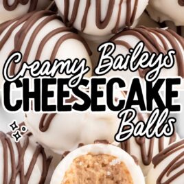 overhead shot of Baileys Cheesecake Balls piled on top of each other on a plate with one split in half with one having a bite taken out of it