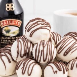 a close-up shot of Baileys Cheesecake Balls piled on top of each other