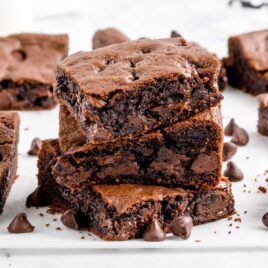 A close-up shot of Cake Mix Brownies piled on top of each other