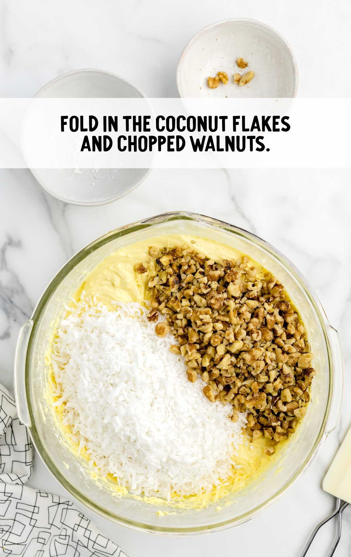 coconut flakes and chopped walnuts folded together