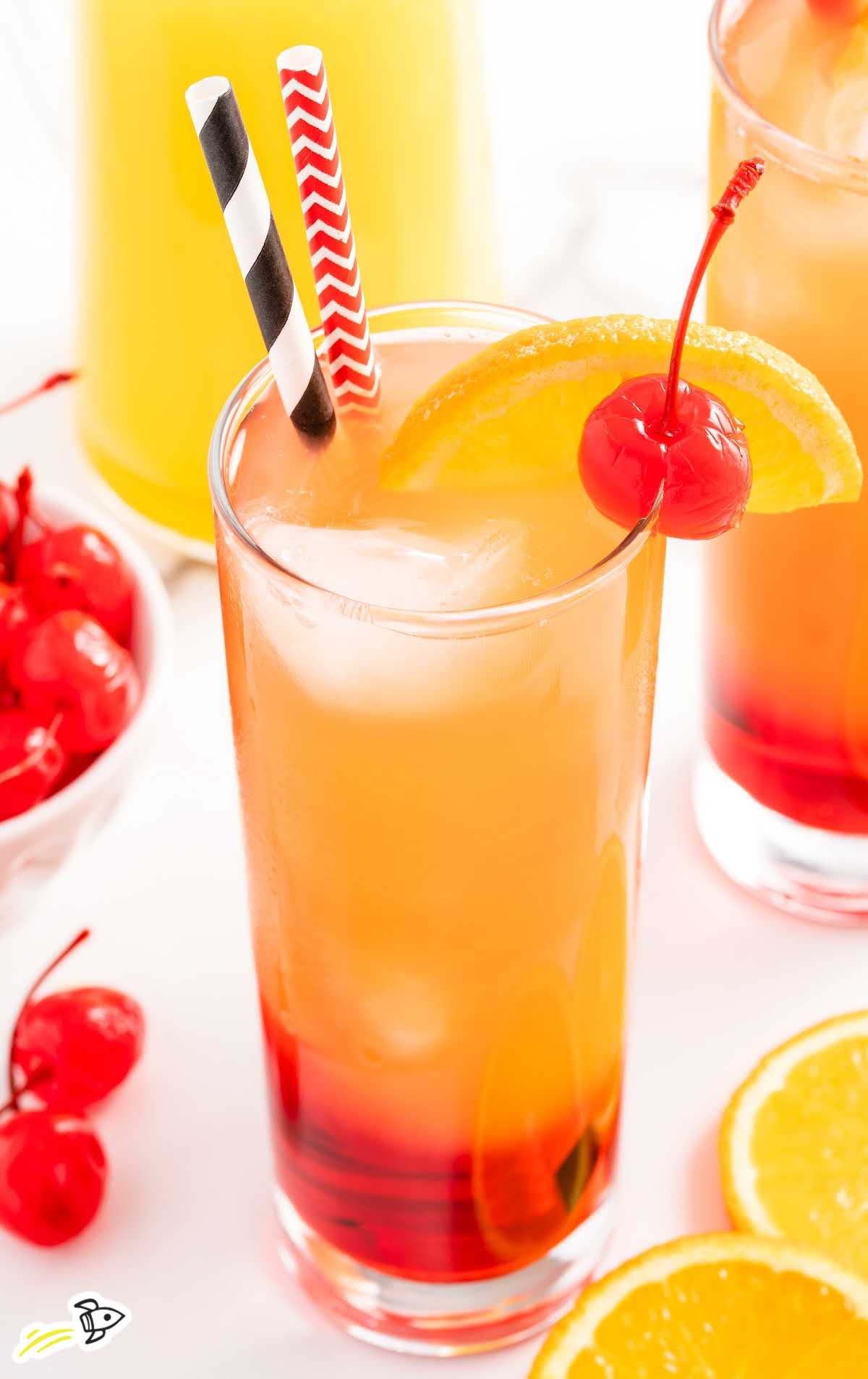 a close-up shot of a Sex On The Beach Drink in a tall glass