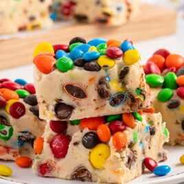 Monster Cookie Dough Fudge stacked on top of each other