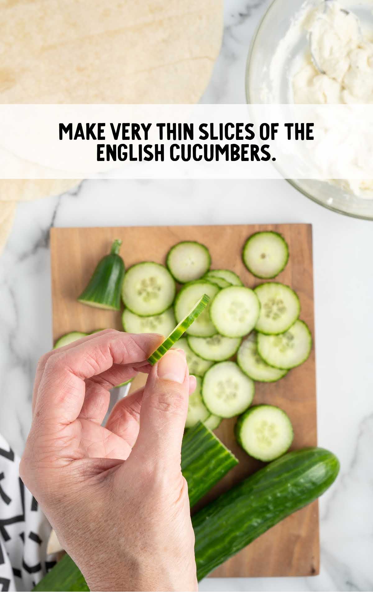 cucumbers into thin slices