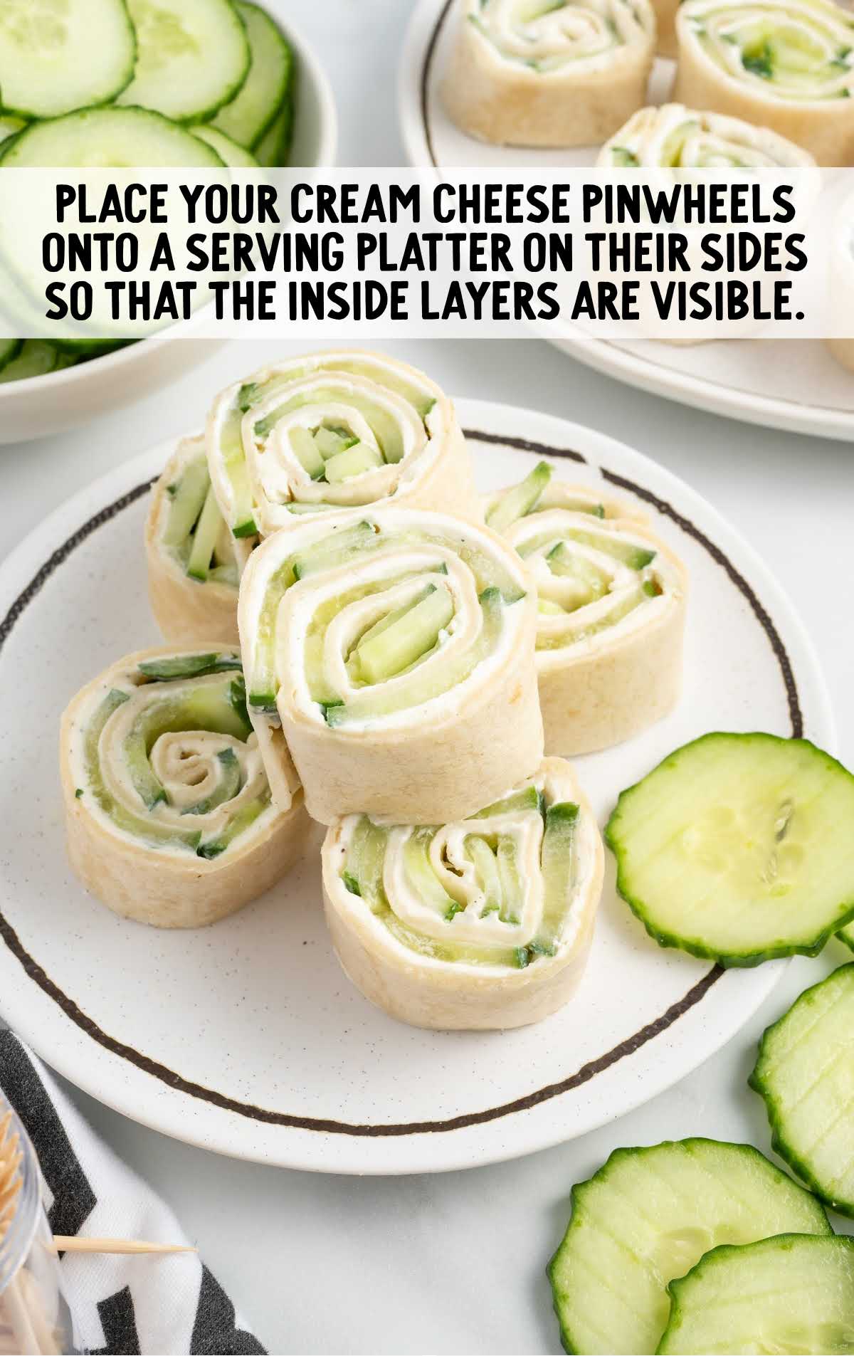 cream cheese pinwheels placed on a serving platter