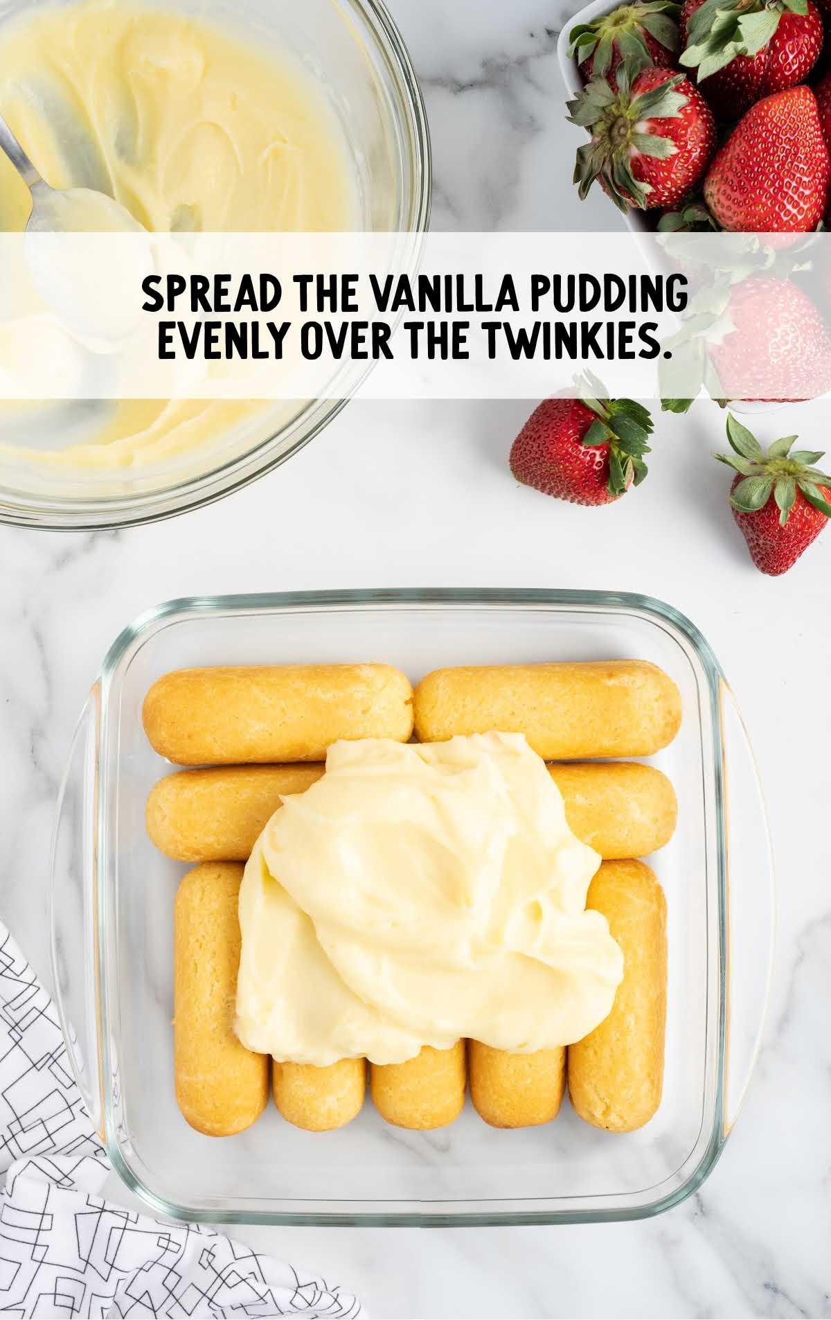 vanilla pudding spread on top of the Twinkies 