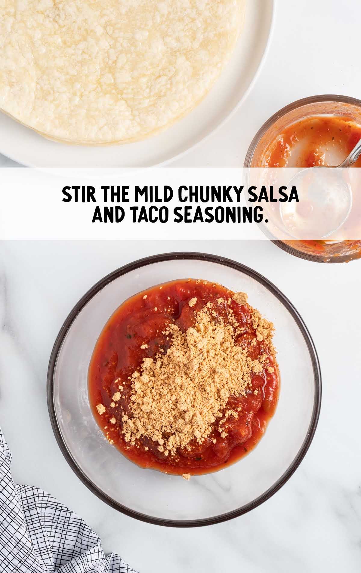mild chunky salsa and taco seasoning stirred together