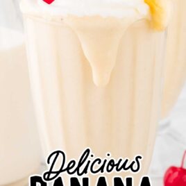 a close up shot of a of Banana Milkshake in a tall glass