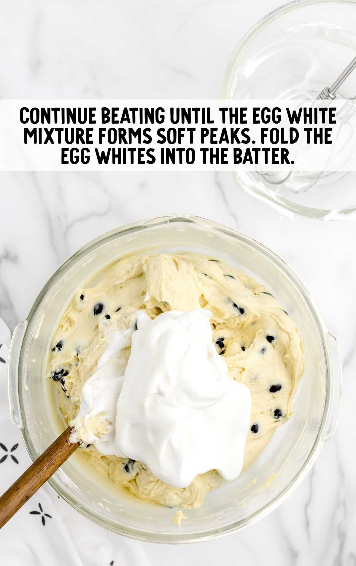 egg whites whisked in a bowl