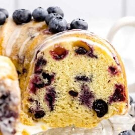 a close up shot of Blueberry Pound Cake with slices taken out