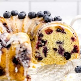 a close up shot of Blueberry Pound Cake with slices taken out