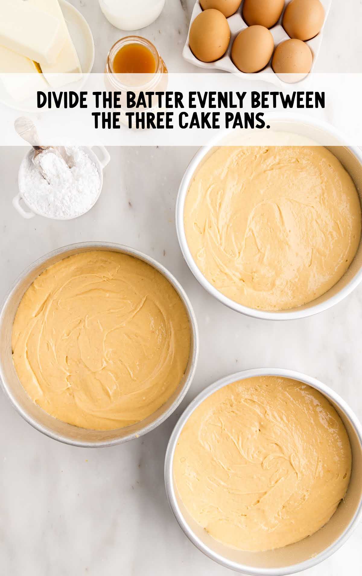 cake batter divided in the cake pans