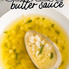 overhead shot of Garlic & Butter Sauce in a bowl with a spoon