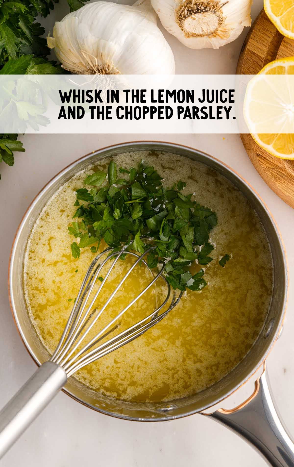 lemon juice and chopped parsley whisked in the garlic mixture in spot