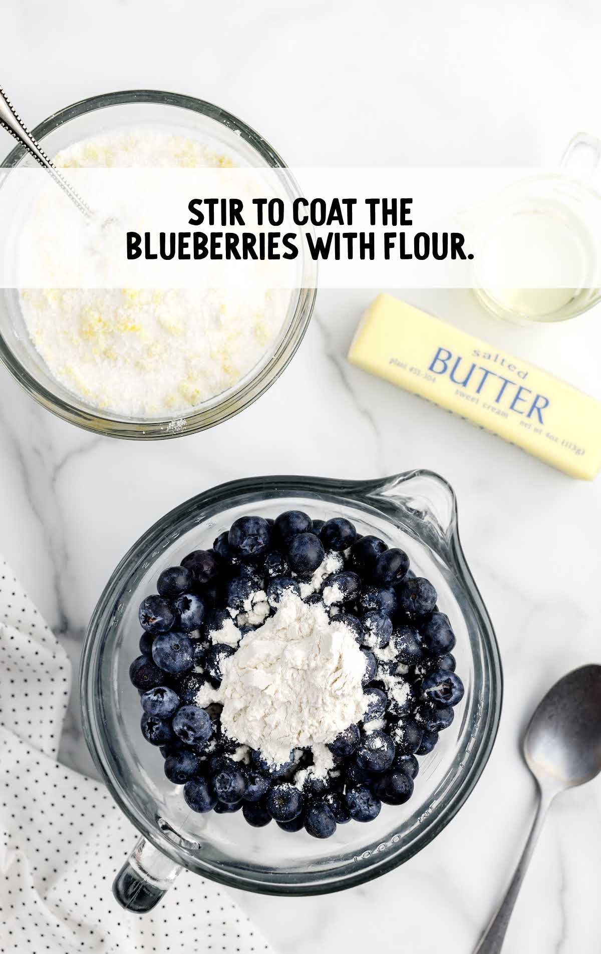 blueberries stirred with flour