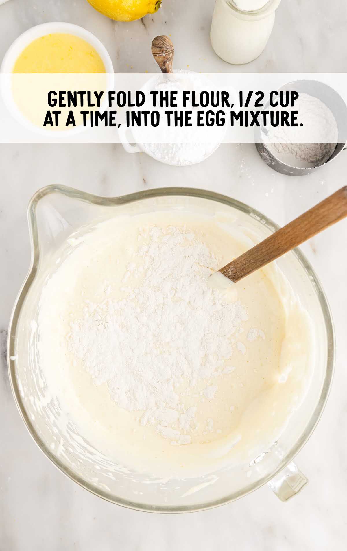 flour and eggs mixture together in a bowl